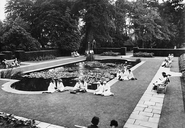 A break from work as Cadbury employees at Bournville rest up during the heatwave