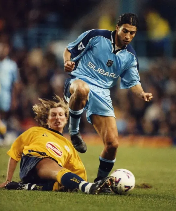 Framed Print : Breaking away: Youssef Chippo is challenged by Robbie Savage