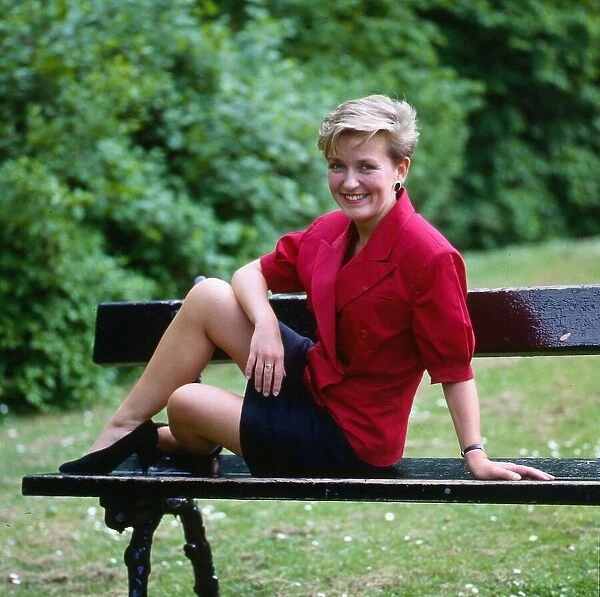 Brenda Paterson TV presenter July 1989 sitting on a park bench