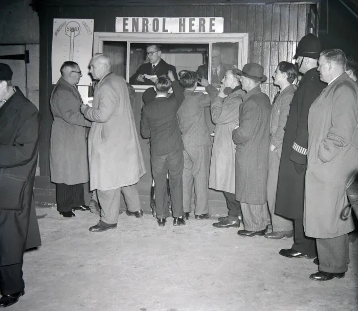 Framed Print : Brentford supporters queue up for cup tie tickets against Chelsea Framed Print : Brentford supporters queue up for cup tie tickets against Chelsea