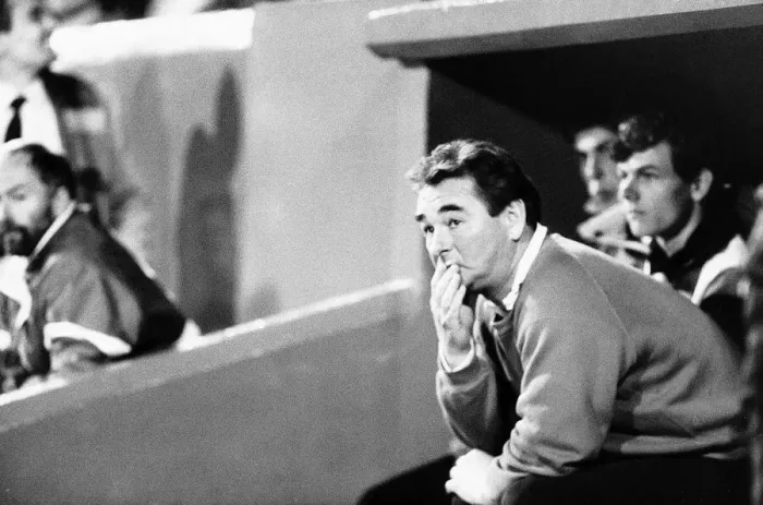 Framed Print : Brian Clough Football manager of Nottingham Forest FC sitting on team bench during match Framed Print : Brian Clough Football manager of Nottingham Forest FC sitting on team bench during match