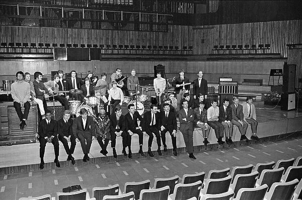 Brian Epstein (front row standing, sixth from the right right