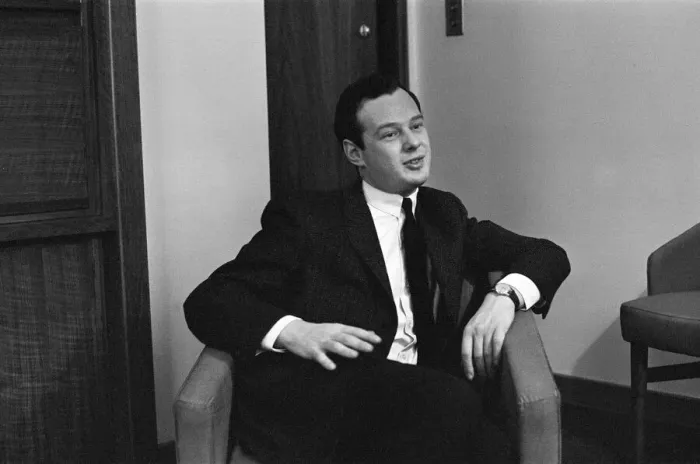 Framed Print : Brian Epstein, Manager of The Beatles, pictured being interviewed for the Daily Mirror in