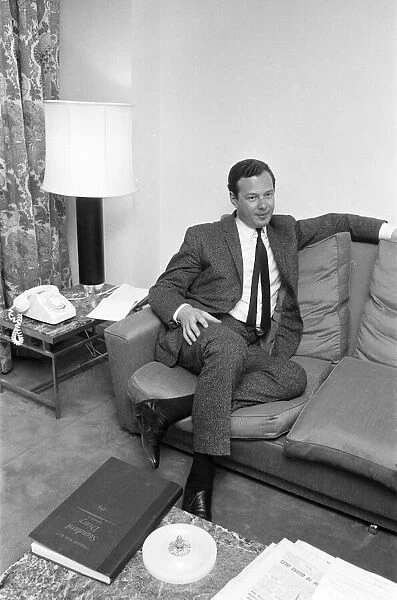 Brian Epstein, Manager of The Beatles, arrives back from New York, USA
