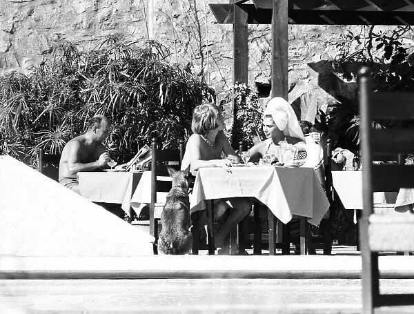 Brian Jones of The Rolling Stones in The Costa del Sol with Suki Poitier before returning