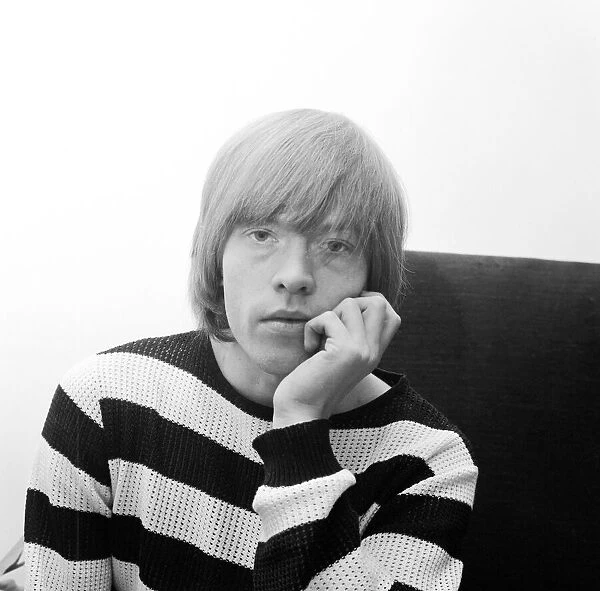 Brian Jones of The Rolling Stones poses for the camera after the single