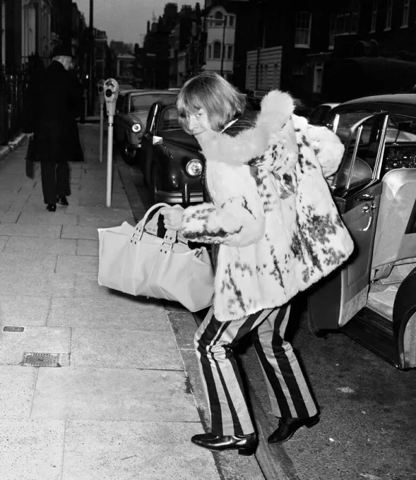Framed Print : Brian Jones of The Rolling Stones sneaks into The London Harley Street Nursing home after Framed Print : Brian Jones of The Rolling Stones sneaks into The London Harley Street Nursing home after