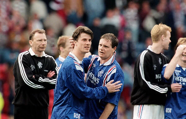 Brian Laudrup and Paul Gascoigne Rangers football players celebrate after their Scottish
