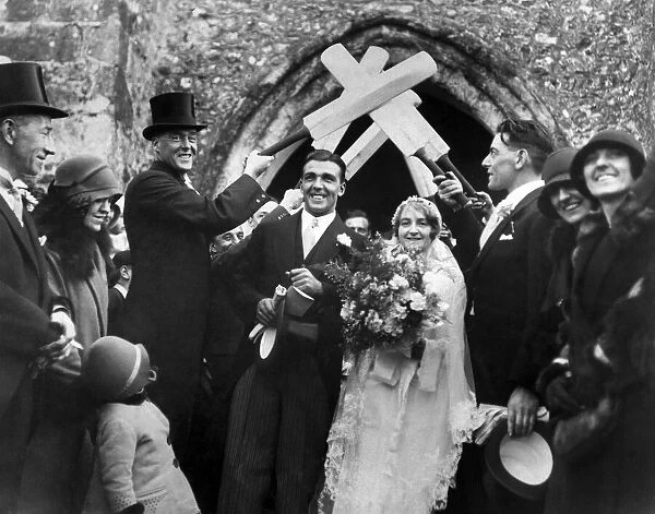 The Bridal Arch at the Wedding of Mr. Leslie Ames the Kent cricketer and Mrs