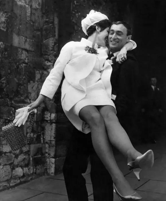 Framed Print : Bride carried by the groom out of the church after their wedding Framed Print : Bride carried by the groom out of the church after their wedding