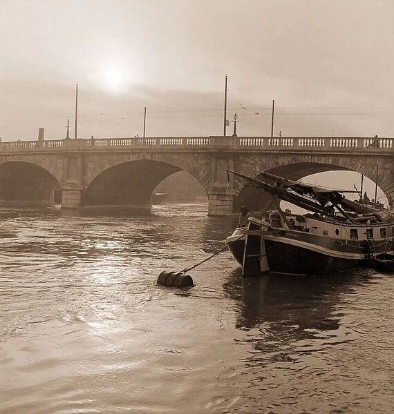 The bridge over the River Thames at Kingston upon Thames as the sun breaks through