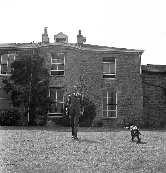 Brigadier Fitzroy Maclean at home with his dog Fury, in Yealand Conyers, Lancashire. 1949