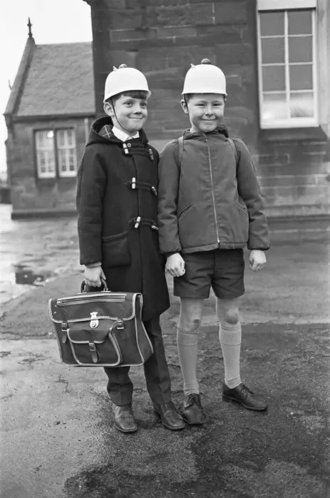 Framed Print : Bright Idea! Two Hamilton schoolboys seen here modelling the latest safety headwear