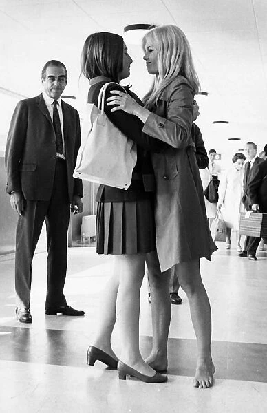 Brigitte Bardot French actress embraces friend 1966 Couturier Helene Vager at
