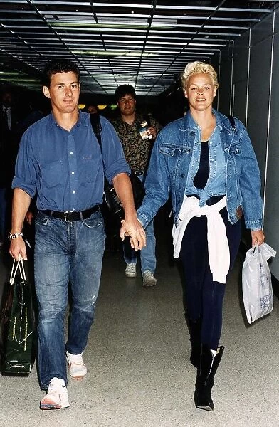 Brigitte Nielsen actress with her boyfriend arrive at Heathrow Airport