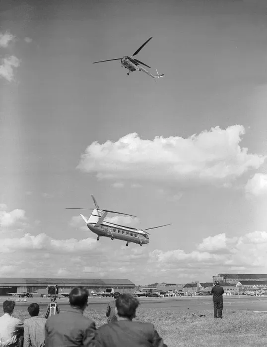 Framed Print : Bristol 171 Sycamore 3 Helicopter flys over the Bristol 192 at the SBAC Farnborough Air Framed Print : Bristol 171 Sycamore 3 Helicopter flys over the Bristol 192 at the SBAC Farnborough Air