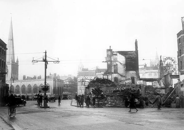 Bristol Bridge in 1940, bomb damage in Victoria Street next to George