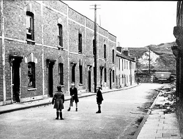 Bristol children playing cricket in the street in Barton Hill during the war