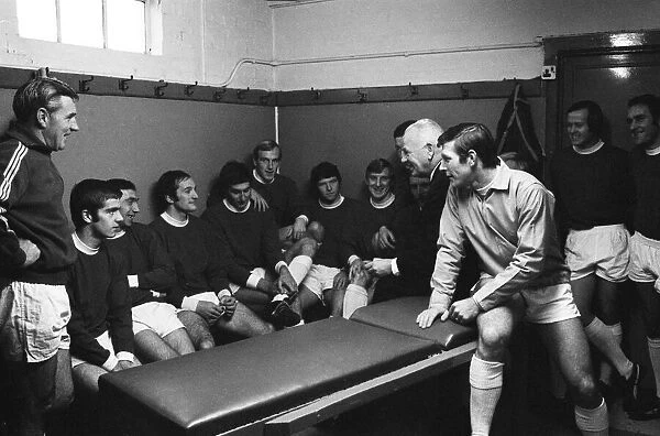 The Bristol Rovers football team have a chat with manager Bill Dodgin in their team