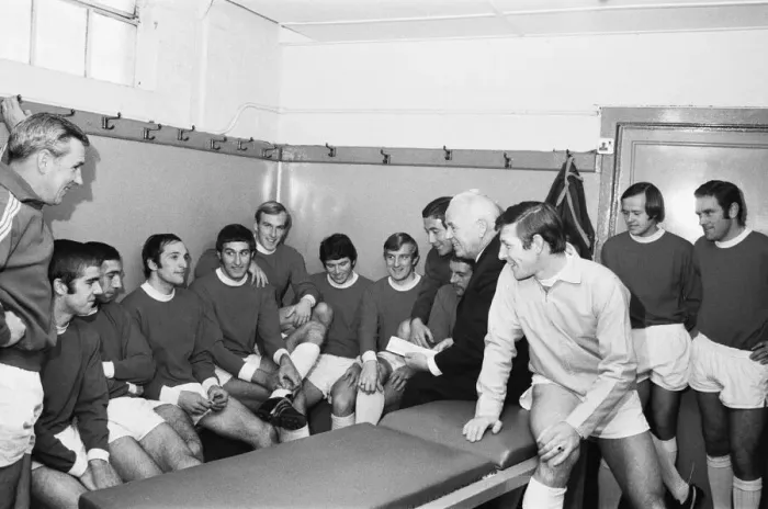 Framed Print : The Bristol Rovers football team have a chat with manager Bill Dodgin in their team