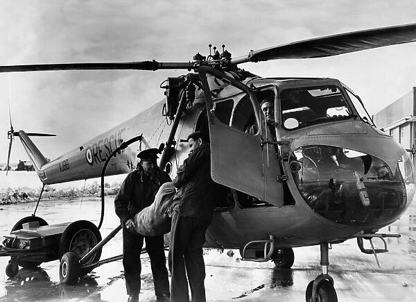 A Bristol Sycamore HR14 Search and Rescue helicopter seen here being refuelled at RAF