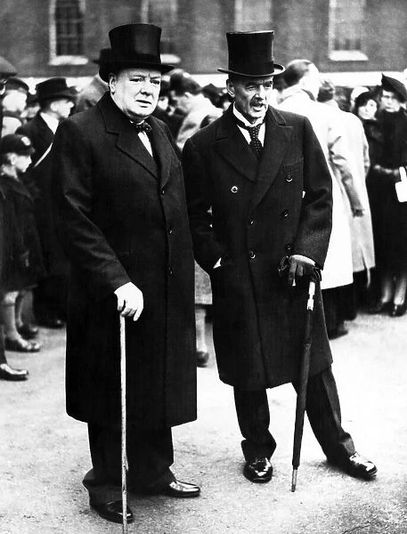 Britains war time premiers. Winston Churchill with Neville Chamberlain in London