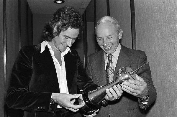 Britains World Motorcycle racing Champion Barry Sheene receives his awards for
