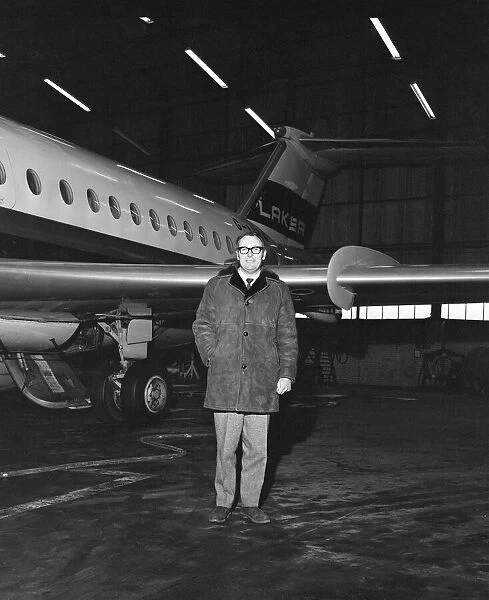 British airline entrepreneur Freddie Laker pictured beside one of his planes