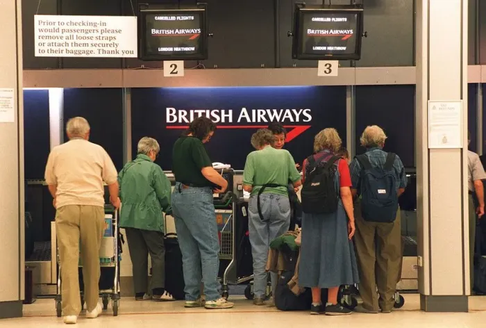 Framed Print : British Airways passengers check in at Edinburgh airport only to find their flight to