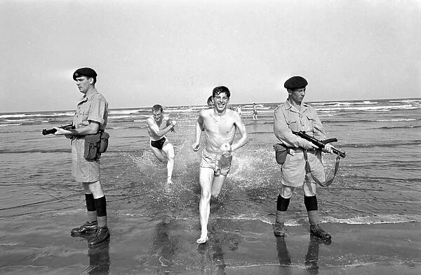 British Army in Aden: Men of the Somerset and Cornwall Light Infantry on the beach with