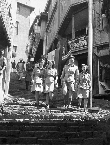 A British army soldiers of the 14th Army walks around the town of Simla in India with