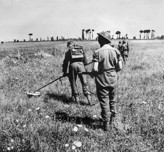 Framed Print : British army soldiers at work searching for enemy mines during the push in to France Framed Print : British army soldiers at work searching for enemy mines during the push in to France