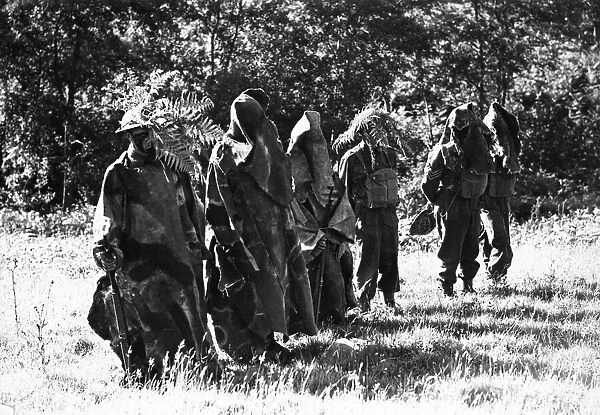 British Army in training in the countryside. Wearing camouflage