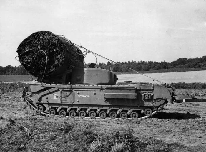 Framed Print : A British AVRE with fascine (a large roll of chestnut palings) in position Framed Print : A British AVRE with fascine (a large roll of chestnut palings) in position