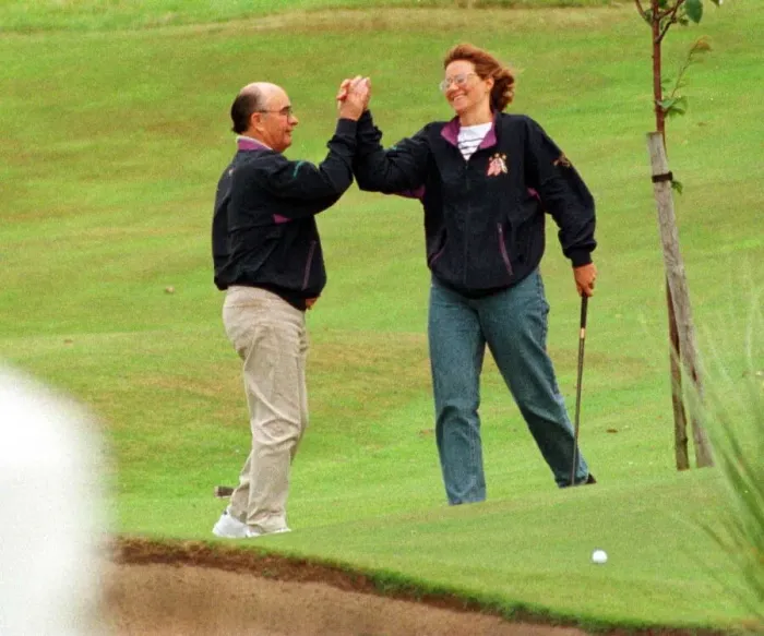 Framed Print : British billionaire Joe Lewis July 1997 on golf course at Turnberry Hotel high five