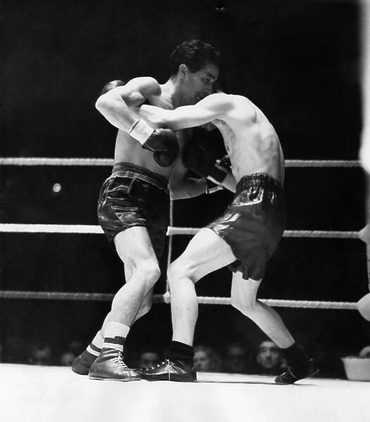 British boxer Peter Kane on the ropes in the second round during his bantamweight fight
