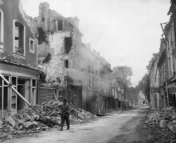 British and Canadian troops enter the liberated town of Falaise, Northern France