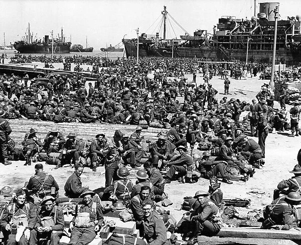 British and Commonwealth troops assemble on the quayside at Alexandria after arriving