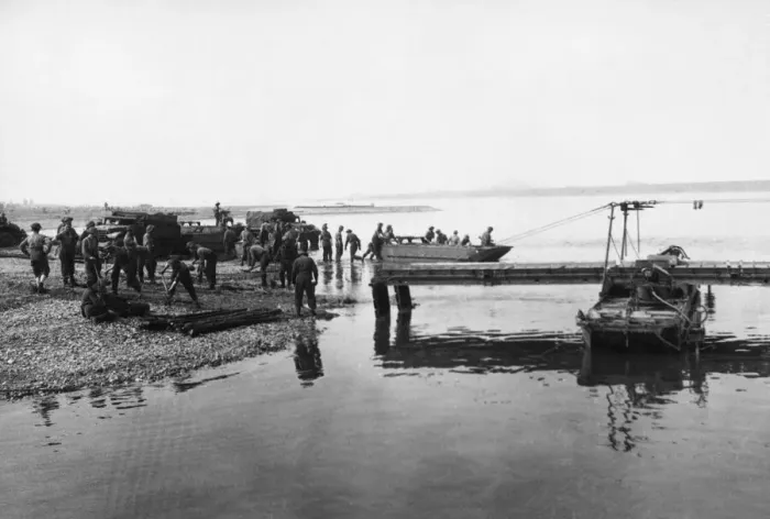 Framed Print : British cross the Rhine. Royal Engineers on the banks of the Rhine launch a pontoon Framed Print : British cross the Rhine. Royal Engineers on the banks of the Rhine launch a pontoon
