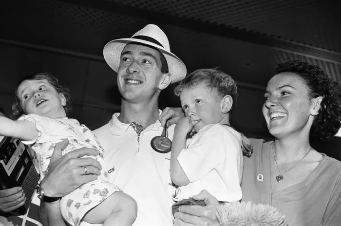 Framed Print : British cyclist Chris Boardman poses with his family on arrival at Manchester airport as