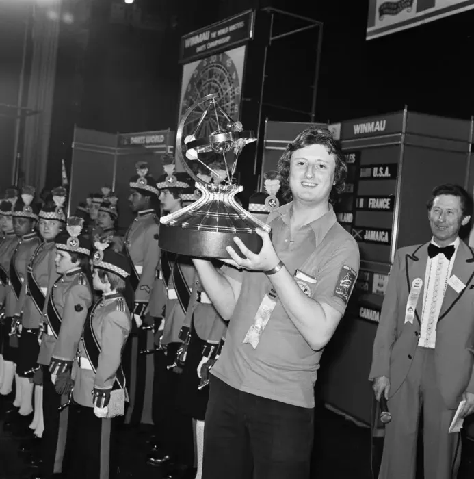 Framed Print : British dart player Eric Bristow holds aloft the trophy after winning the Worlds Masters Framed Print : British dart player Eric Bristow holds aloft the trophy after winning the Worlds Masters