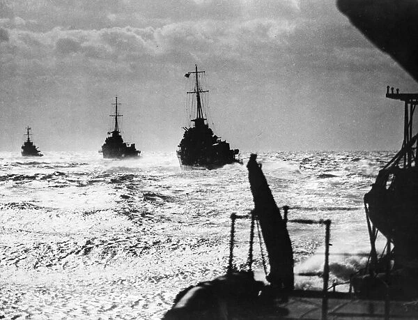 British destroyers at sea. Destroyers silhouetted against the skyline