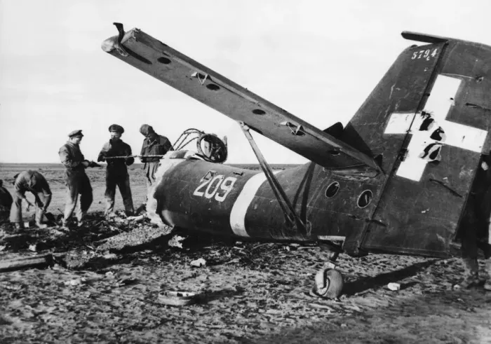Framed Print : British Effectives examining all that was left of a Junkers Bomber destroyed by an R. A Framed Print : British Effectives examining all that was left of a Junkers Bomber destroyed by an R. A