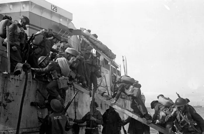 Framed Print : British re enforcement land on Gold beach for the big push into the Normandy town of Caen Framed Print : British re enforcement land on Gold beach for the big push into the Normandy town of Caen