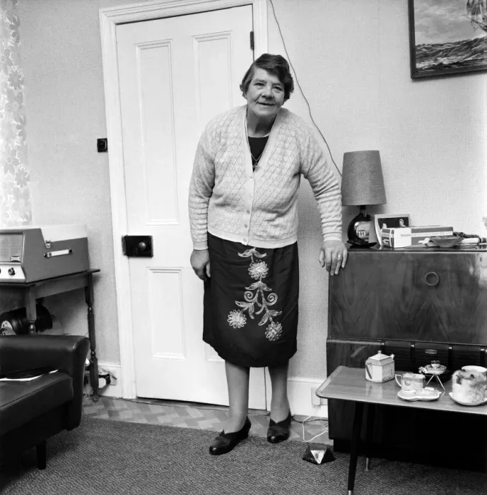 Framed Print : British family feature: A grandmother standing in her living room November 1969