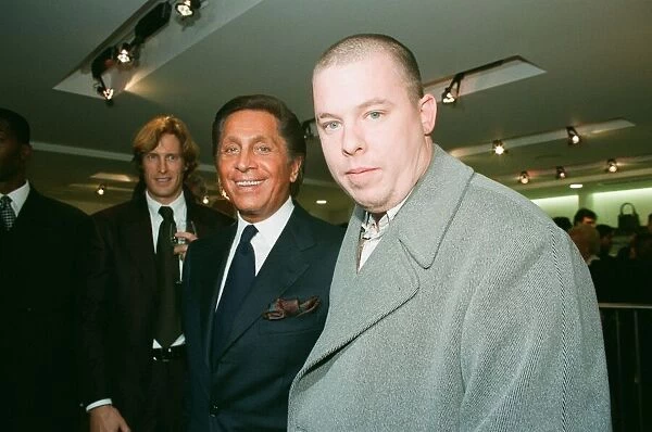 British fashion designer Alexander McQueen (right) seen here with Valentino at