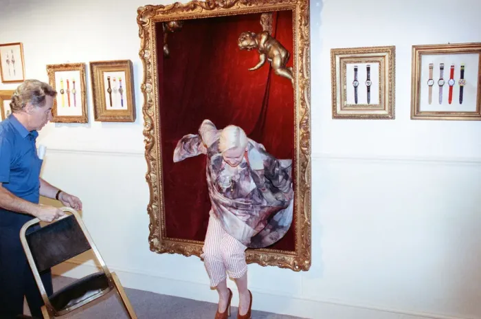 Framed Print : British fashion designer Vivienne Westwood, posing as an oil painting and jumping out Framed Print : British fashion designer Vivienne Westwood, posing as an oil painting and jumping out