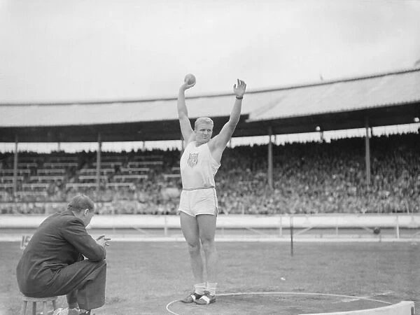British Games at White City 1950 O Chandle ( US) putting the weight SP