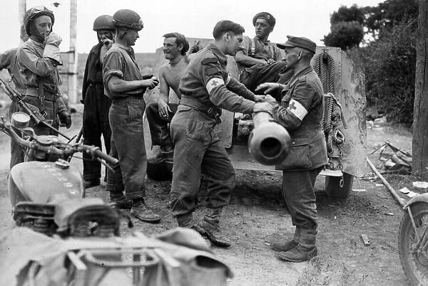 British and German Red Cross Men meet, France. August 1944