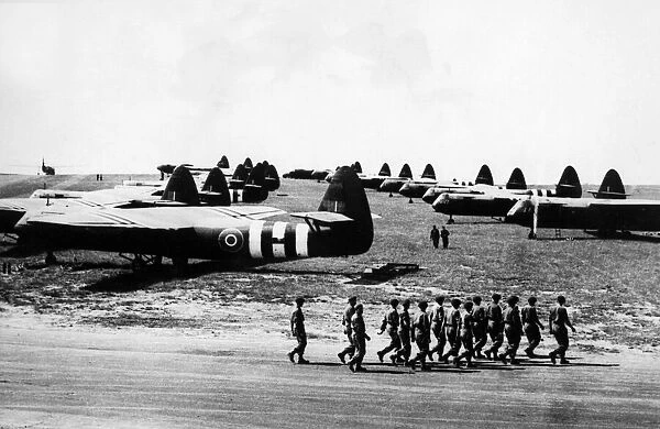 British Glider borne troops march out to board their craft for take off in the first